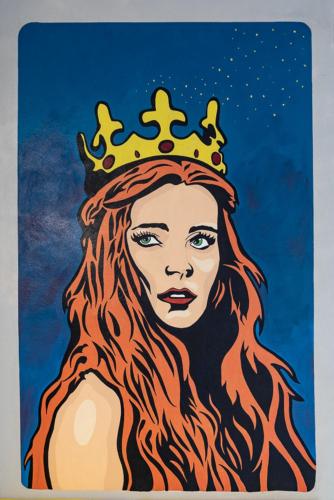 a painting of a woman wearing a crown at Ostello San Filippo Neri in Modena