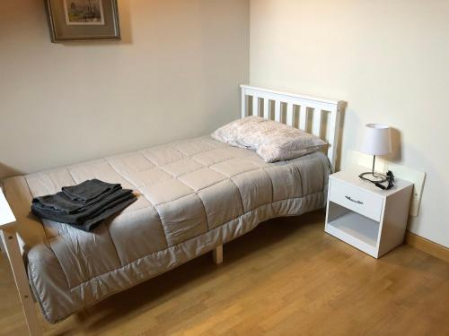 Postel nebo postele na pokoji v ubytování APPARTAMENTO NELLE LANGHE