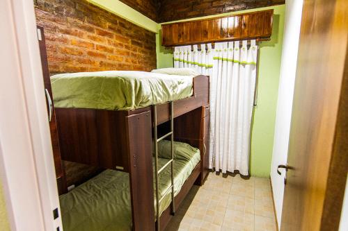 En eller flere senge i et værelse på Sol del Este