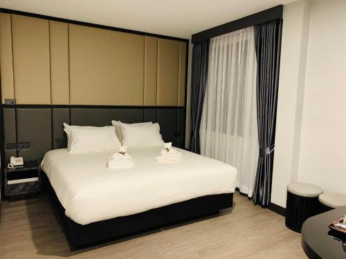 Orasa hotelにあるベッド