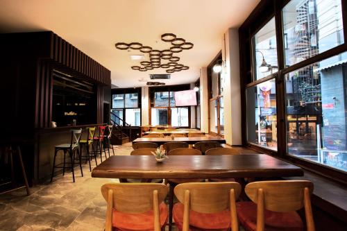 a restaurant with a row of tables and chairs at West Palace in Istanbul