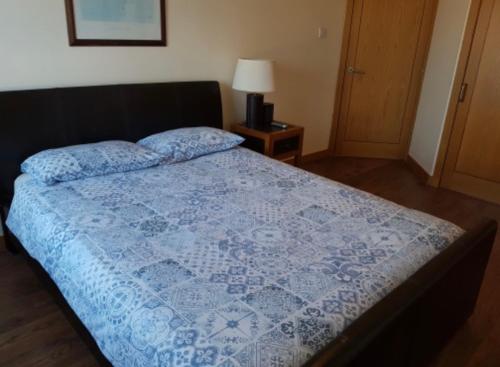 Ένα ή περισσότερα κρεβάτια σε δωμάτιο στο Beachview Apartment