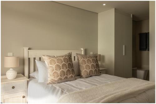 Ένα ή περισσότερα κρεβάτια σε δωμάτιο στο View @ The Bay Apartments