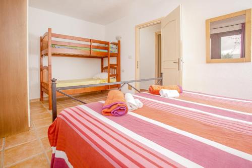 Posteľ alebo postele v izbe v ubytovaní Relax tra terra e mare