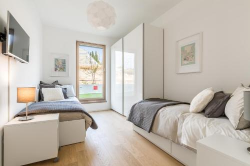 Posteľ alebo postele v izbe v ubytovaní The Majestic Bel Etage Upscale Apartment with Pool