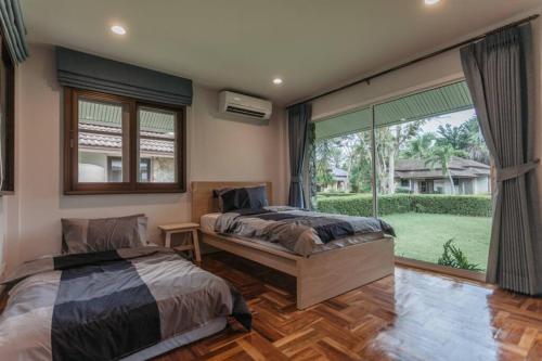 Gallery image of F5 3 Bed Rooms Beach house, full kitchen in Rayong