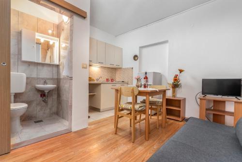 TV a/nebo společenská místnost v ubytování Apartments Vera Savic