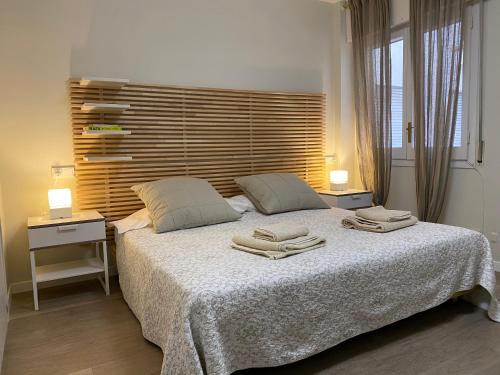 Giường trong phòng chung tại Ponent - Espectaculares vistas al mar