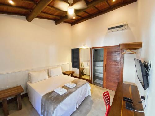 Cama o camas de una habitación en Pousada Alto da Pipa
