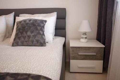 Apartman Nikiにあるベッド