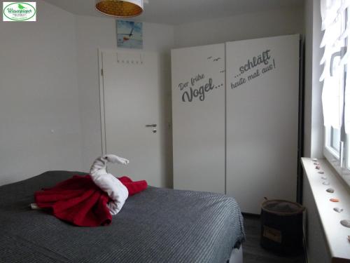 Postel nebo postele na pokoji v ubytování Ostsee-Wiesenpieper (Graal-Müritz)
