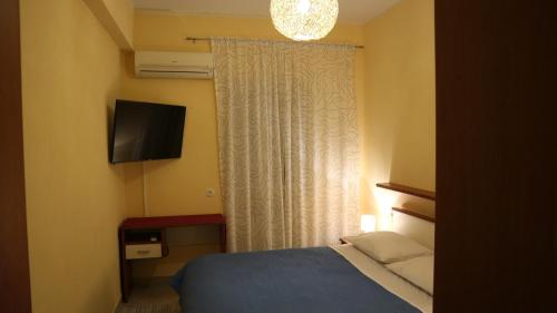 Katil atau katil-katil dalam bilik di Apartments Komel II