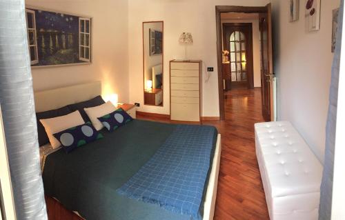a bedroom with a large bed and a white dresser at Il giardino nascosto in Rome