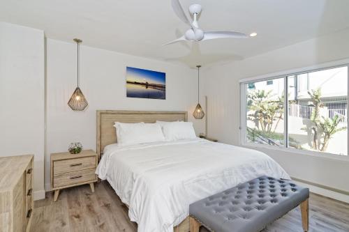 Tempat tidur dalam kamar di Ocean Villas Beach Front