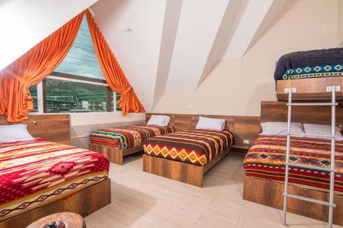 Voodi või voodid majutusasutuse The Traveler Hostel toas
