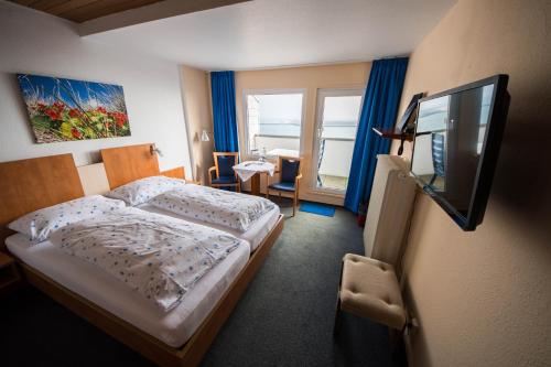 Postel nebo postele na pokoji v ubytování Hotel Panorama Garni