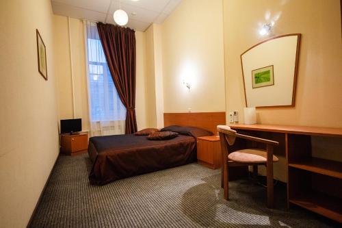 Posteľ alebo postele v izbe v ubytovaní Nevsky 136 Guest House