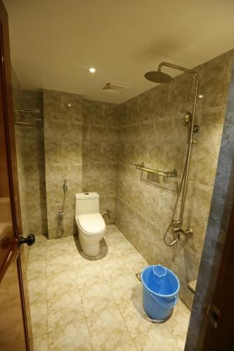 Um banheiro em Nitheesh Residency