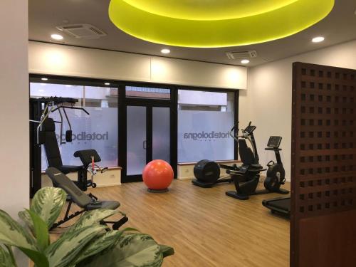 a gym with treadmills and exercise bikes in a room at Best Western Plus Hotel Bologna in Mestre