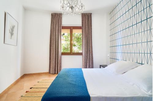 Posteľ alebo postele v izbe v ubytovaní Apartamento en centro ciudad con vistas al mar