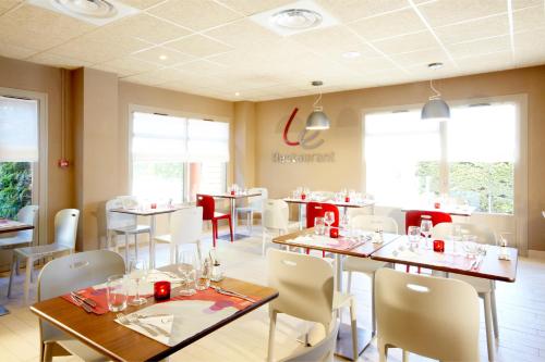 Restoran ili neka druga zalogajnica u objektu Campanile Nîmes Centre Mas-Carbonnel