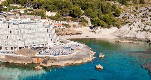an aerial view of a hotel and a beach at Globales Don Pedro - Adults Only in Cala de Sant Vicent