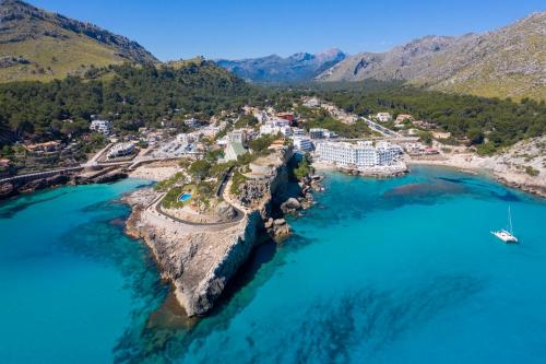 an aerial view of a resort on the shores of the ocean at Globales Don Pedro - Adults Only in Cala de Sant Vicent