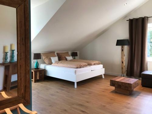 Postel nebo postele na pokoji v ubytování Lauras Weinherberge