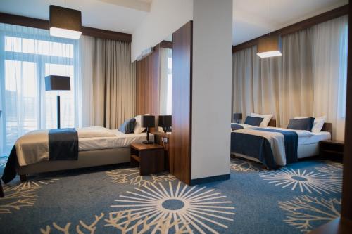 Giường trong phòng chung tại Kasor Resort & Spa