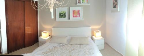 Ένα ή περισσότερα κρεβάτια σε δωμάτιο στο Residencial Los Geranios 13