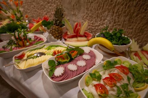 a table with many different types of food on it at Lavender Cave Hotel in Nevşehir