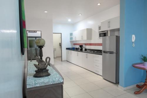 Kuchyň nebo kuchyňský kout v ubytování Apartamentos Torre II Condominios - Pet Friendly