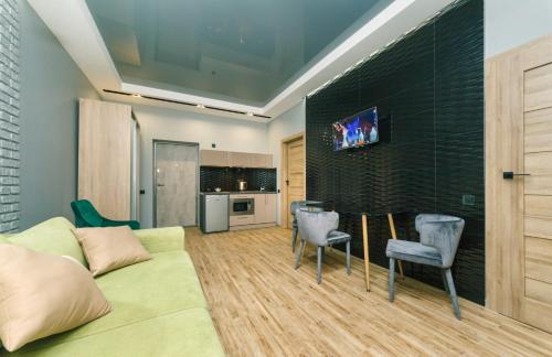 Кухня или мини-кухня в Tomas apartments
