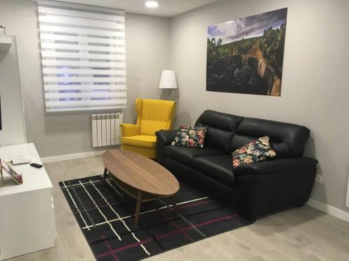 Χώρος καθιστικού στο Apartamento Expectacular,céntrico,nuevo 5 min a pie de la Laurel Vivienda de uso Turistico