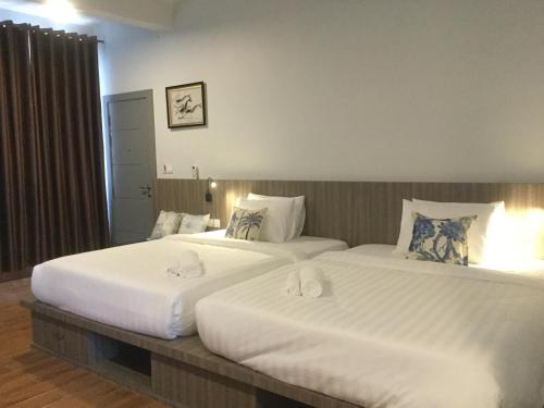 Postel nebo postele na pokoji v ubytování 2N Residence