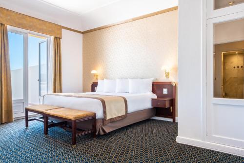 Кровать или кровати в номере Eurostars Gran Hotel La Toja