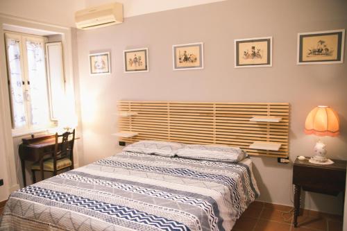 Кровать или кровати в номере La casa del Nespolo