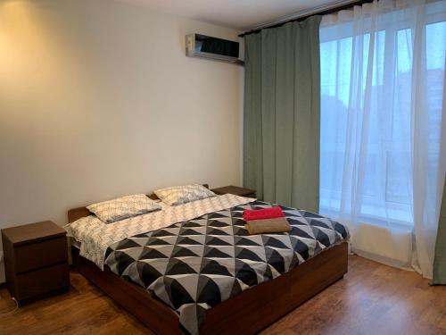 מיטה או מיטות בחדר ב-Apart-Hotel Just-M