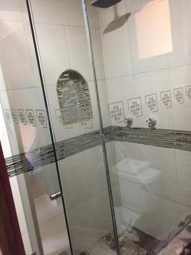 Ванна кімната в HOTEL BOUTIQUE JAYCO
