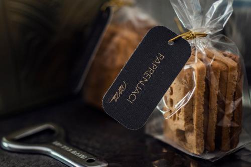 a bag of bread with a tag on it at Pod Zidom Rooms in Zagreb