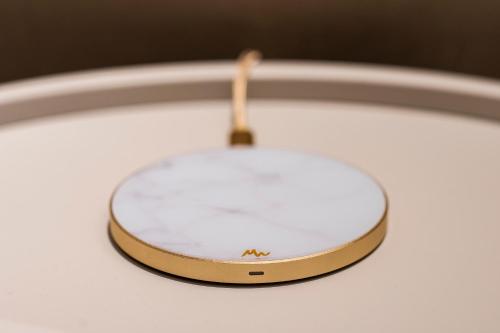 a close up of a light fixture on a ceiling at Pod Zidom Rooms in Zagreb