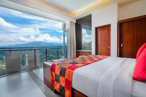 Кровать или кровати в номере Mount Blue Kandy