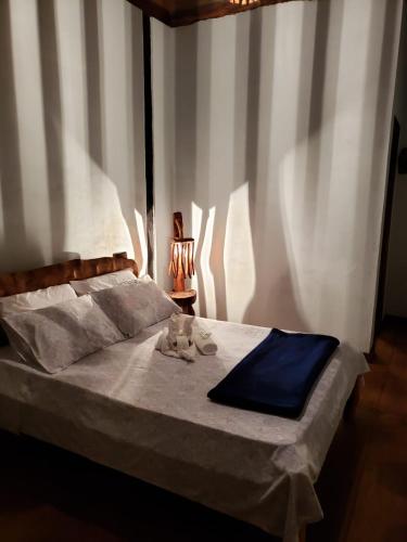 Ένα ή περισσότερα κρεβάτια σε δωμάτιο στο Pousada São Gonçalo