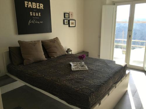 Een bed of bedden in een kamer bij Zaira House