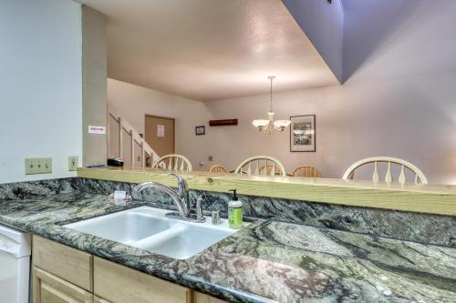 a bathroom with a sink and a mirror at The Summit 276 in Mammoth Lakes