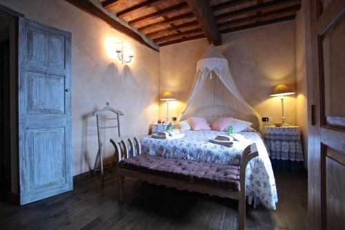Postel nebo postele na pokoji v ubytování La Locanda del Moro