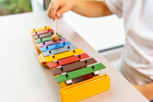a child playing with a lego building toy at Hotel Xylophon - inklusive Thermeneintritte in Lutzmannsburg
