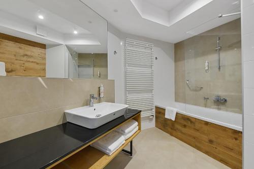 Koupelna v ubytování Aparthotel Termy Uniejów
