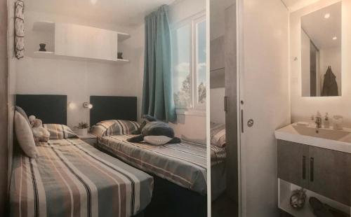 Postel nebo postele na pokoji v ubytování Mobile home Istra BI VILLAGE