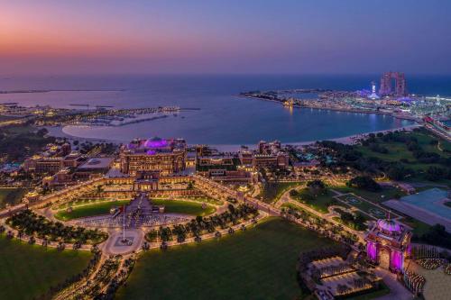 an aerial view of the city of dubai at night at Grand Hyatt Abu Dhabi Hotel & Residences Emirates Pearl in Abu Dhabi